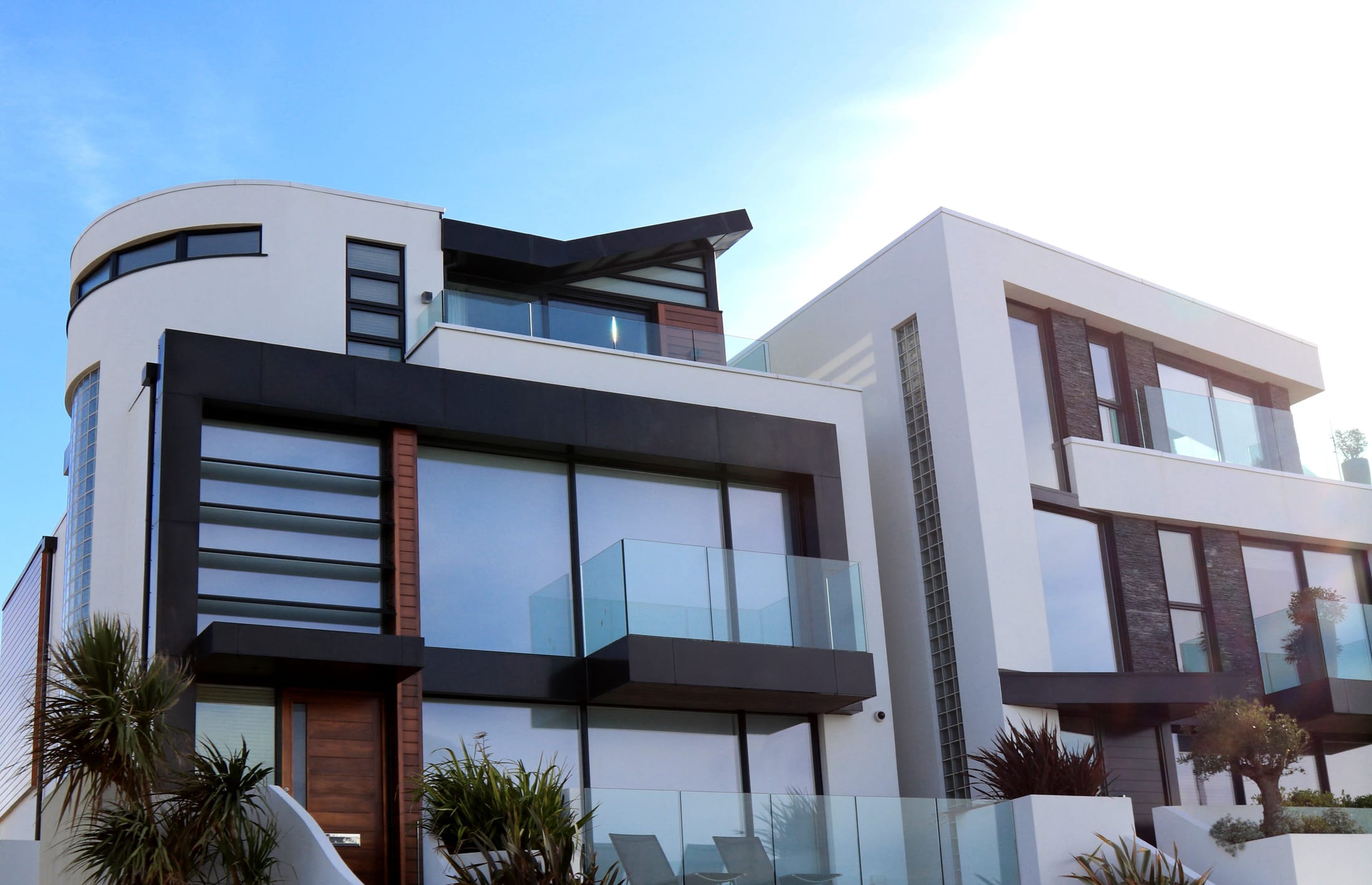 A contemporary white and glass architectural house exterior